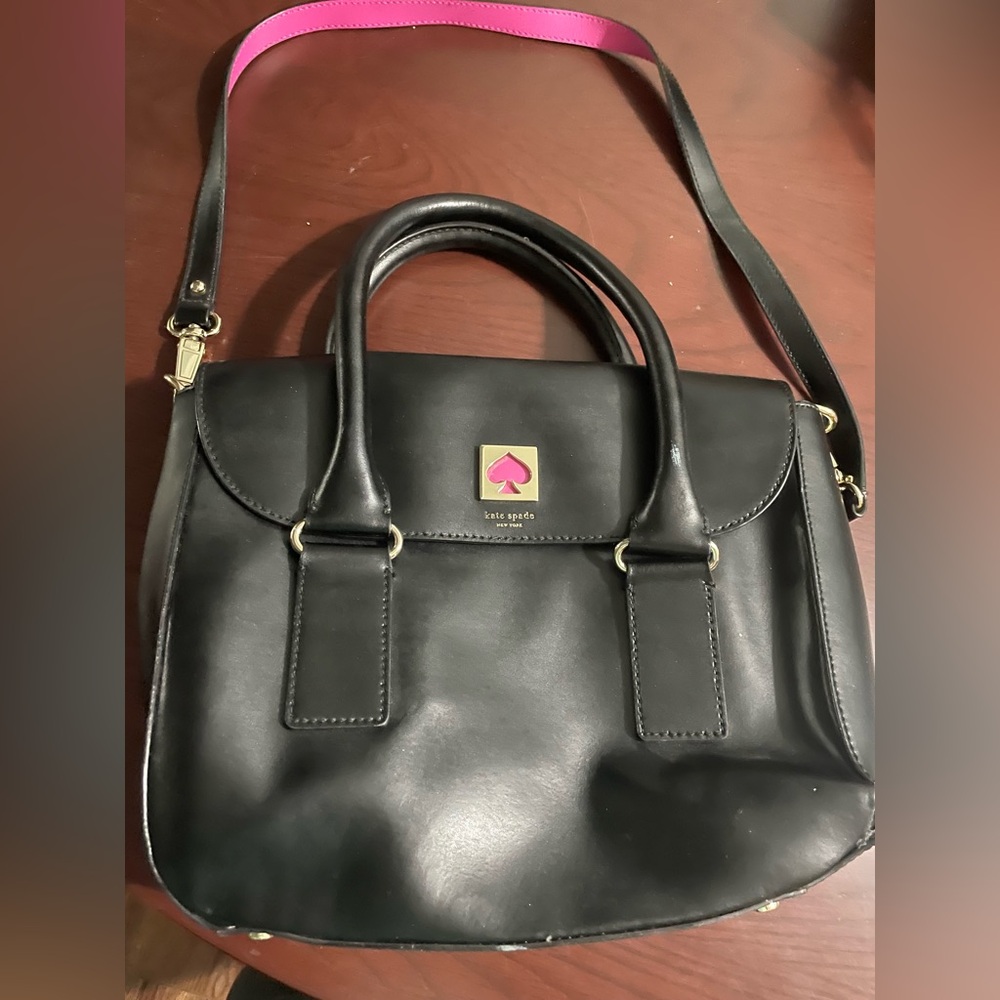 Kate Spade black leather purse in excellent like new condition.